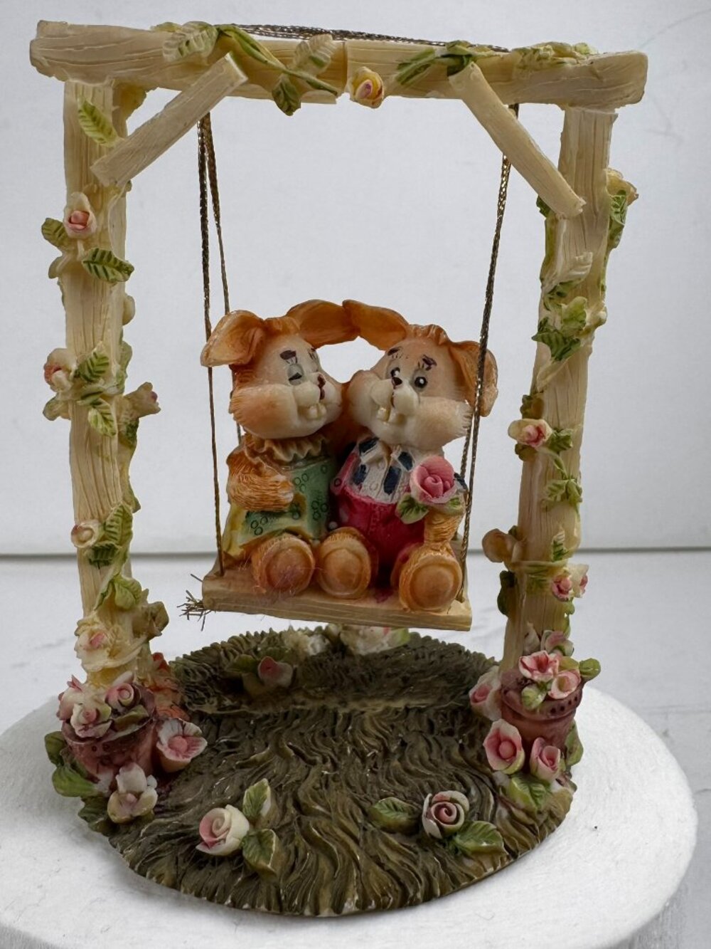 resin bunny rabbits on garden swing trellis floral figurine 5" broken top beam